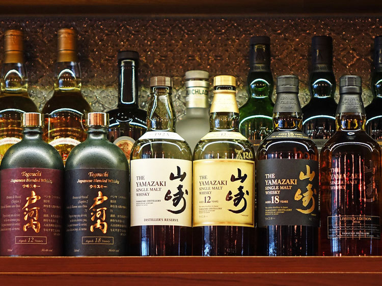 japanese whiskies behind bar