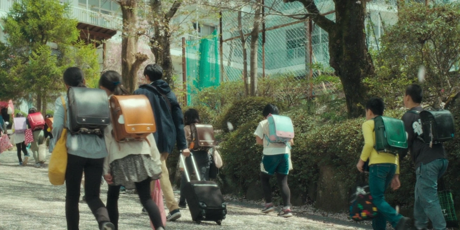 Attending Japanese School - Randoseru. From the movie Monster2024Director Hirokazu Koreeda