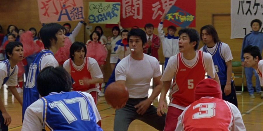 japanese school students playing baskeyball. From movie Battle Royale 2000Director Kinji Fukasaku