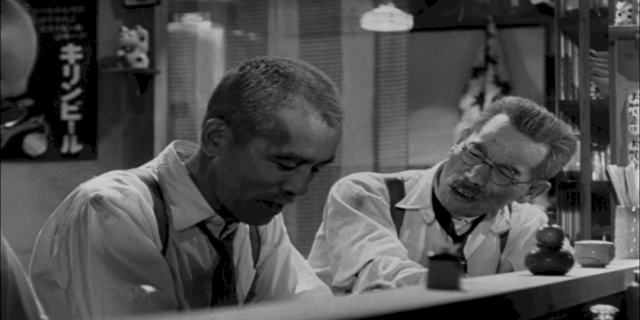 Two men talking inside the izakaya bar (Tokyo Story - 2)