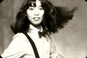 black and white portrait of mariya takeuchi japanese city pop singer known for plastic love and the revival of 1980s city pop music online.