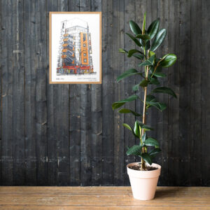 Colored Artwork of the Sega Akibahara Building 2 or the Gigo 2 Building, displayed in a wall beside a plant