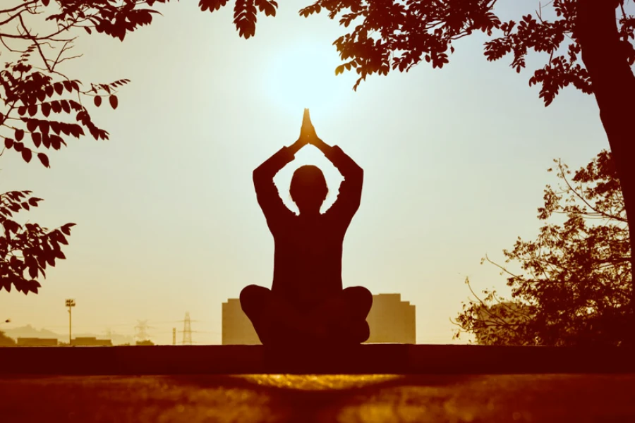 a woman doing a yoga pose