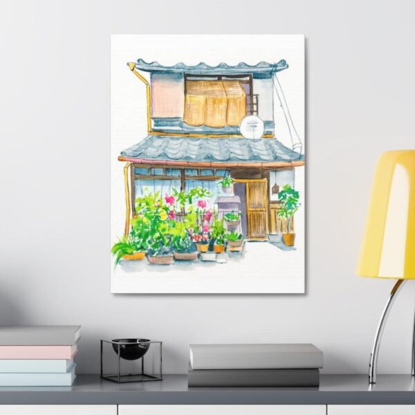 Vibrant watercolor painting of Garden Machiya displayed above a study desk
