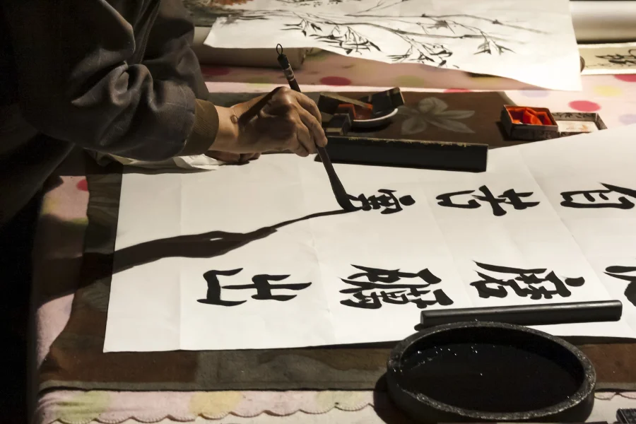 A person showcasing his Japanese Writing and Calligraphy Skills
