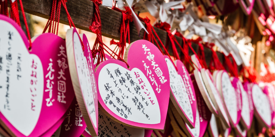 Heart shaped valentine's notes attached to a temple in Japan