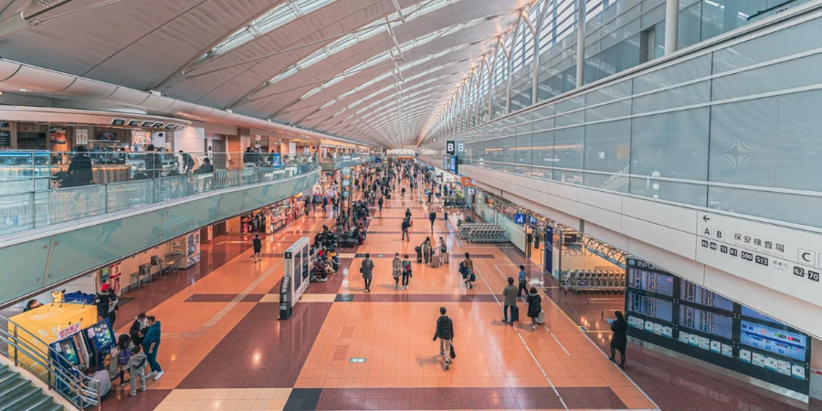 People walking around Tokyo's Haneda Airport in Japan