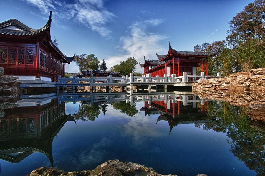 Japanese temple reflecting in the pond Japanese temple reflecting in the pond