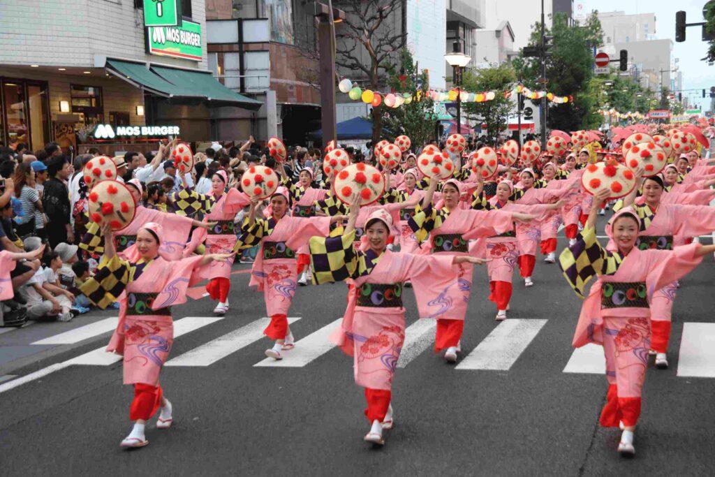 Yamagata Hanagasa Festival Participants in traditional outfits dancing in the streets