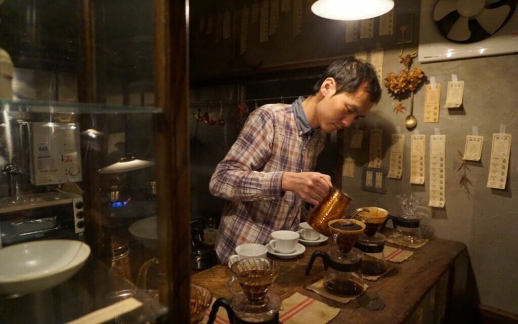 A Guy Making Coffee in an Izakaya A Guy Making Coffee in an Izakaya