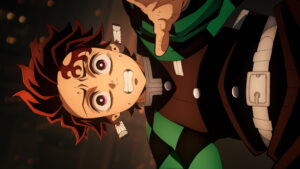 tanjiro kamado close up in intense battle moment showing fear determination and emotion representing demon slayer infinity castle arc final fights and character growth.