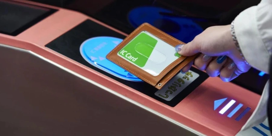 A person scanning Suica IC card in the subway