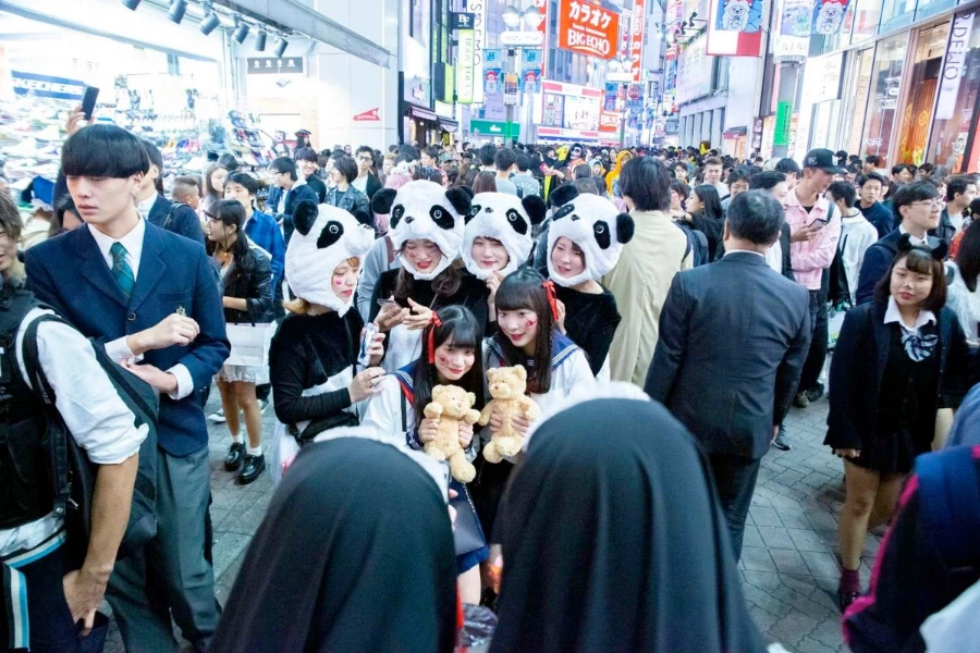 Group dressed as pandas for Halloween in Japan