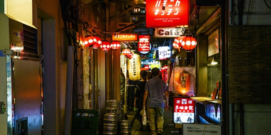 A man walking along Harmonica Yokocho