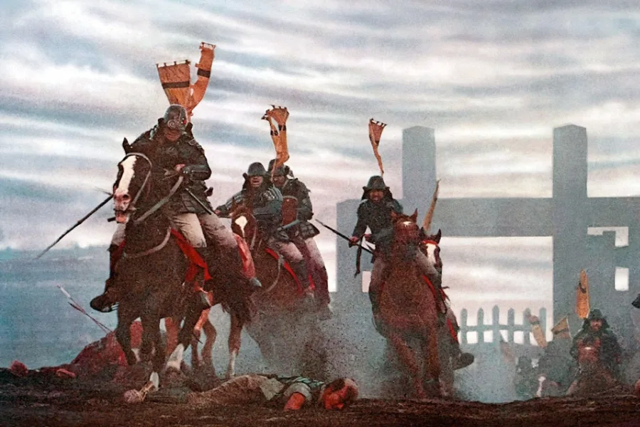 Screen grab of warriors riding horses in a Jidaigeki film