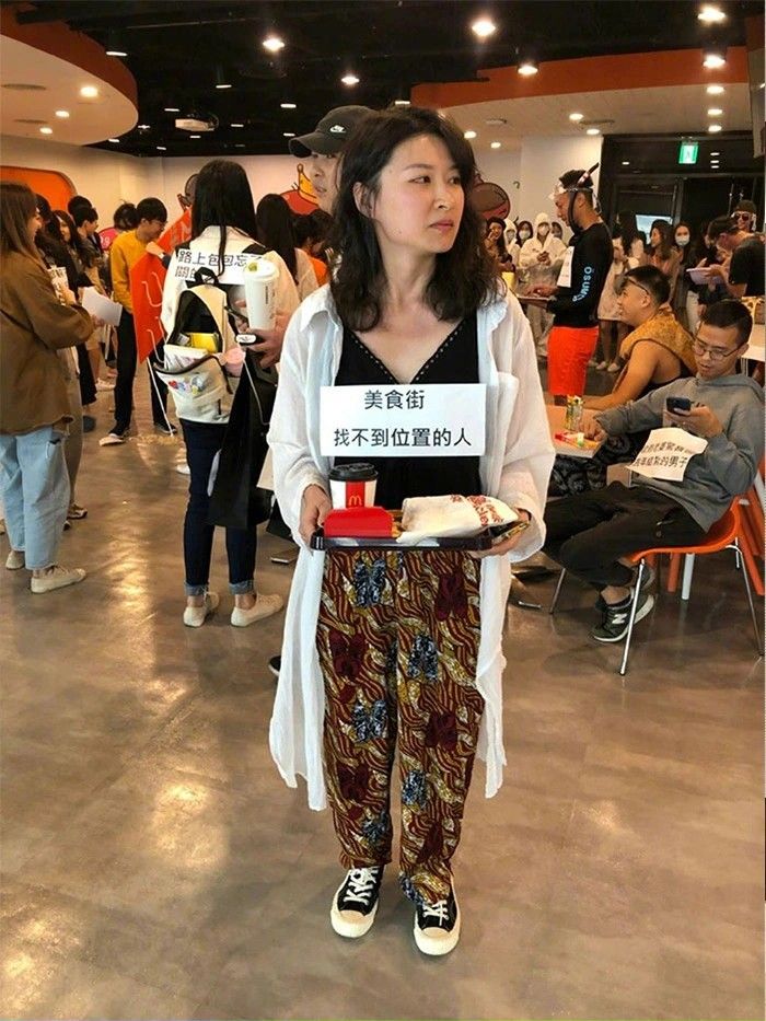 The-woman-looking-for-a-seat-at-food-court Halloween in Japan