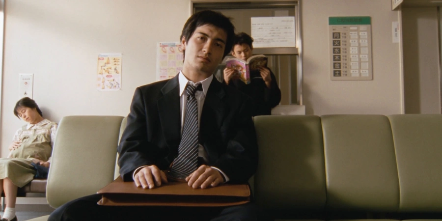 business man contemplating in a Japanese business setting