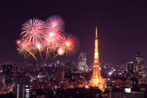 Fireworks and the Tokyo tower light up the city on New Year's.
