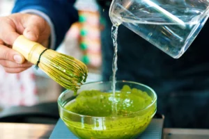 making matcha at a cafe
