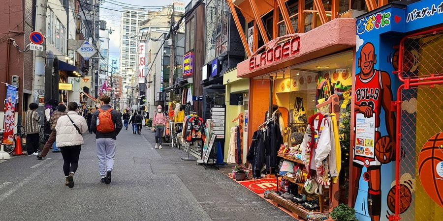 Shops and crowds lining the Amerika-mura shopping street in OSaka
