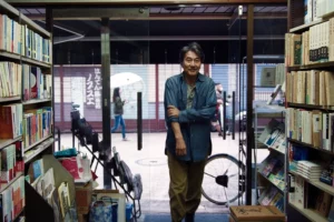 Perfect Days (2023). Directed by Wim Wenders. Visiting a bookstore.