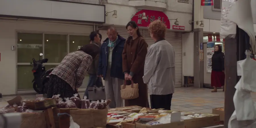 checking out second hand goods at a Tokyo market