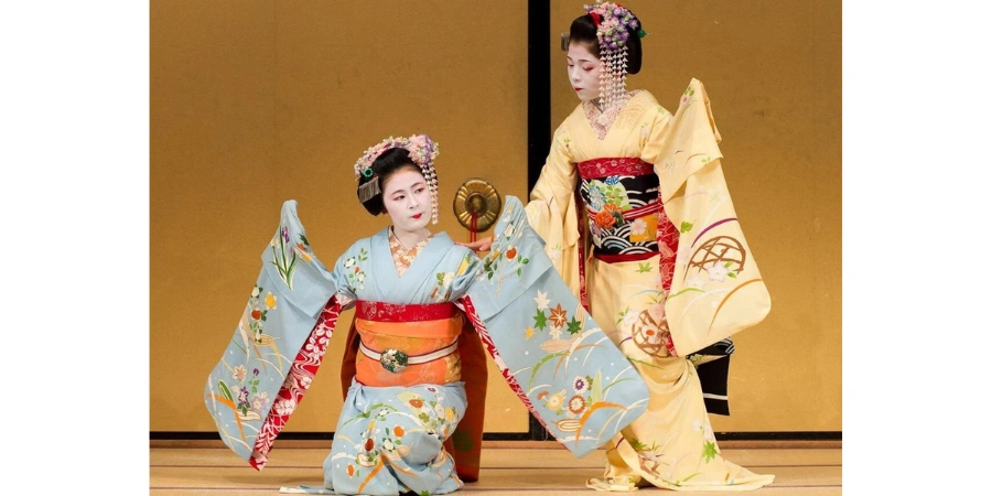 Two geishas performing in a Japanese theatre (Gion Corner)