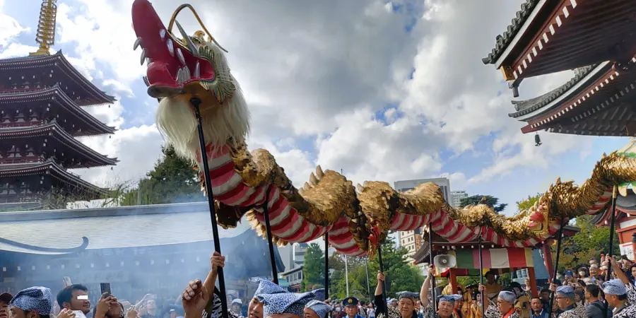 Large golden dragon dancing across the temple