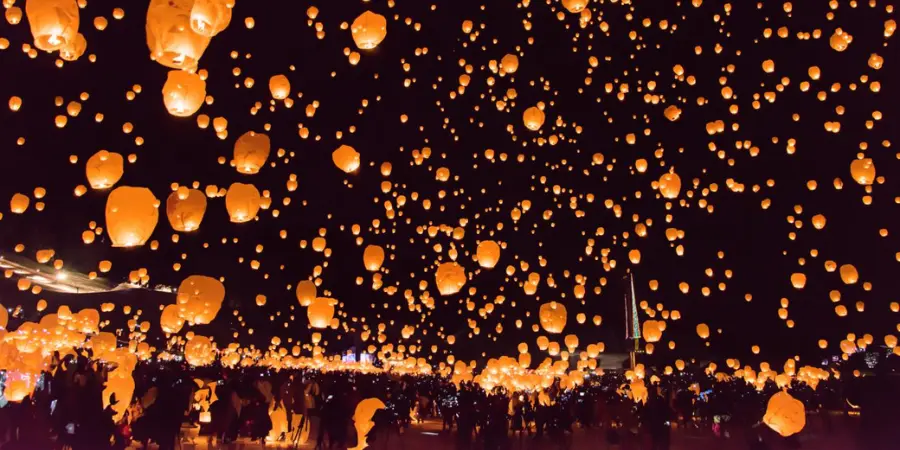 Lanterns are released into the sky and light up the night