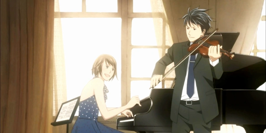 Nodame at the piano and Chiaki playing violin in a sunlit room, classical music anime scene from Nodame Cantabile highlighting musical performance and romance.
