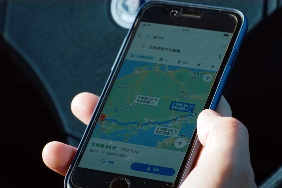 Drive my Car (2021) using google Maps to navigate around Japan, in a car