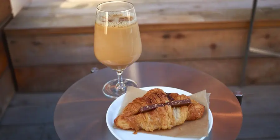 GOOD GOODIES cafe menu options of the chocolate croissant and the ice coffee