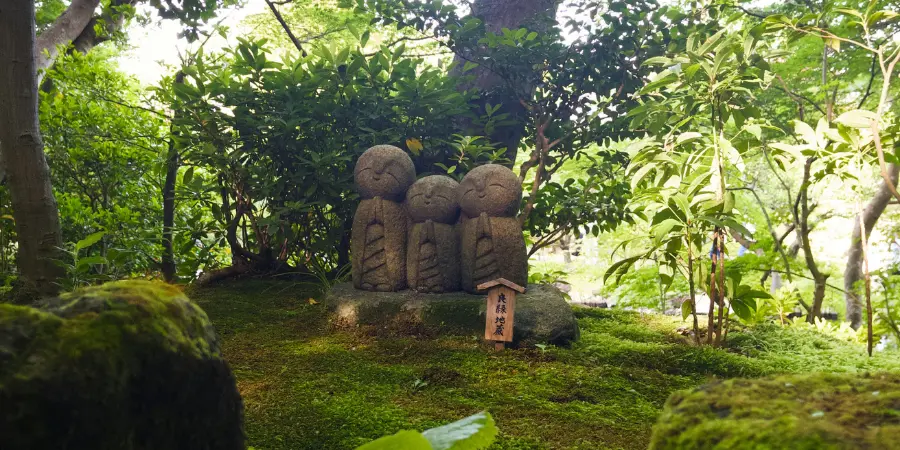 Jizo Statues in Kamakura in a Japanese garden by a sacred shrine