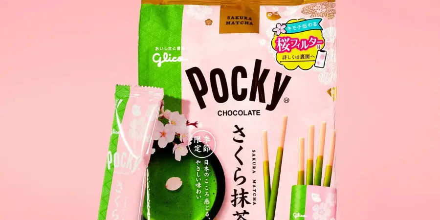 A box package of Pocky biscuit sticks that are sakura and matcha flavored.