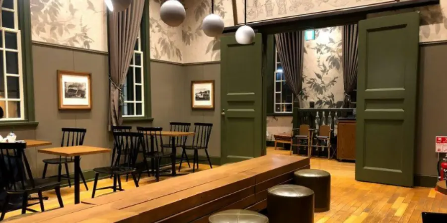 Retro interior of Starbucks Dogo Onsen station made with railway construction materials