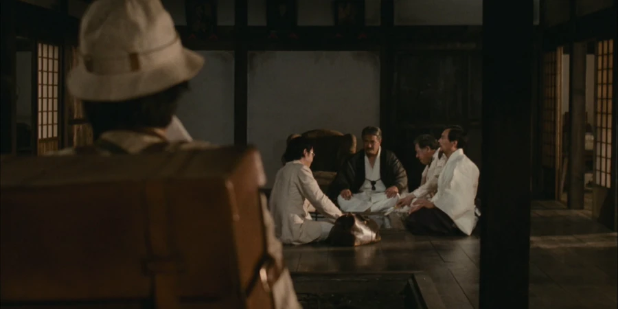 A person witnessing a meeting, taken during the Meiji Period (from "The Yasha Pond")
