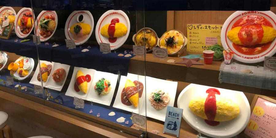 Different kinds of omuraice offered in a Japanese restaurant