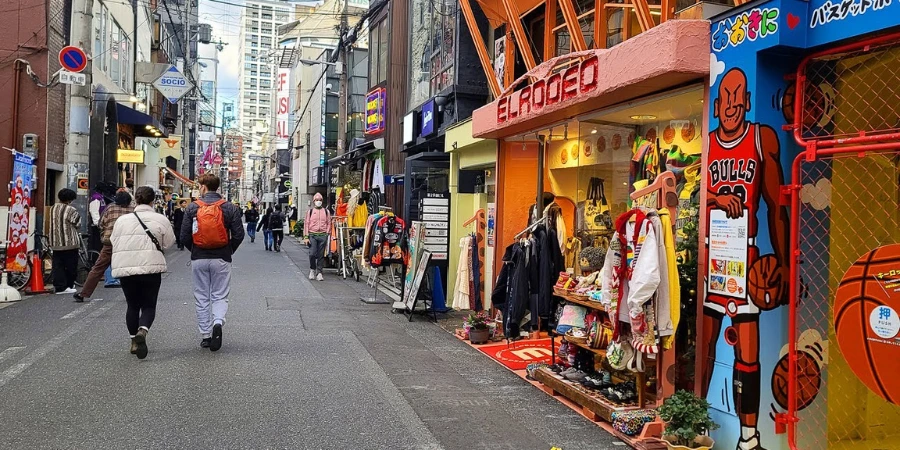 People walking around the street with shops