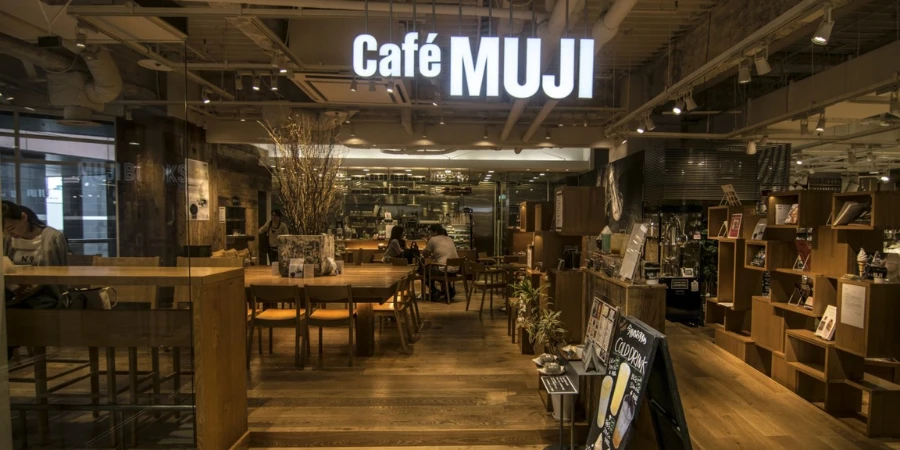 Interior of a Muji Cafe in Tokyo, with tables, chairs, and displays