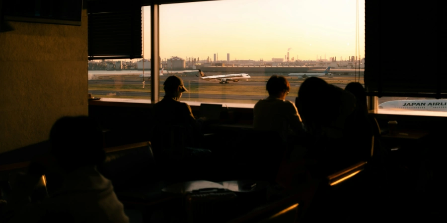 Airport Lounge overlooking JAL airplanes at dusk