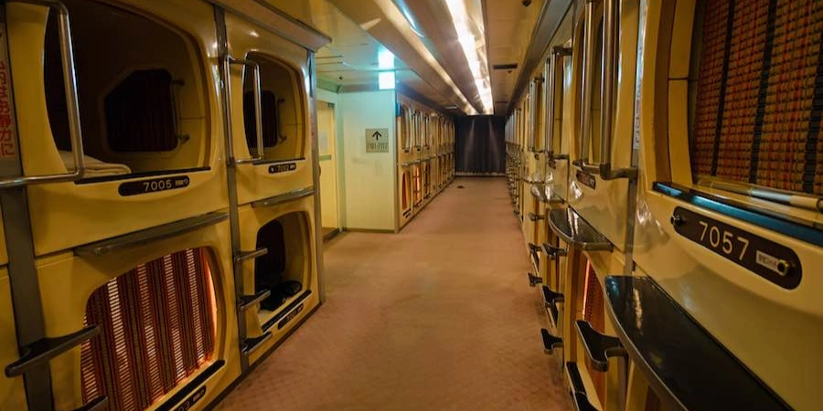 Brown and yellow capsule hotel in Tokyo, Japan