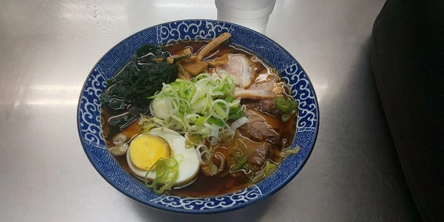 soy sauce ramen with a lot of meat and egg