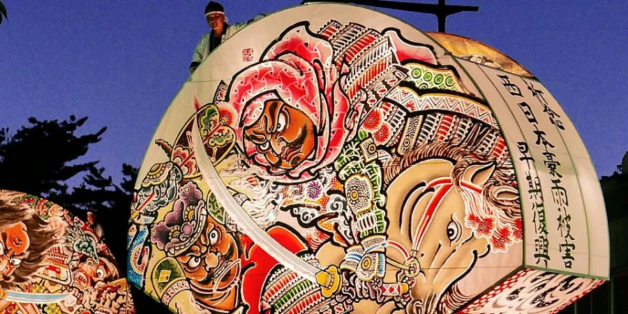 Massive illuminated Neputa float depicting a samurai warrior at the Hirosaki Neputa Matsuri in Aomori Prefecture, Japan.