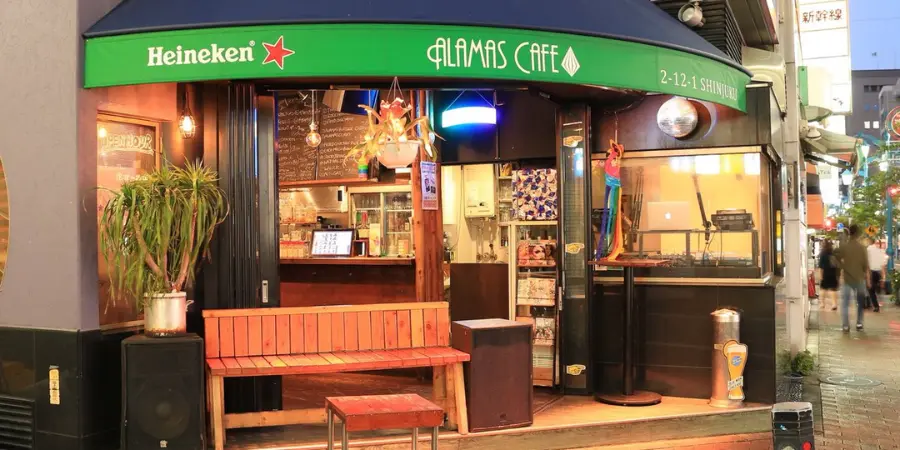 The open-air exterior of ALAMAS CAFE in Ni-chome