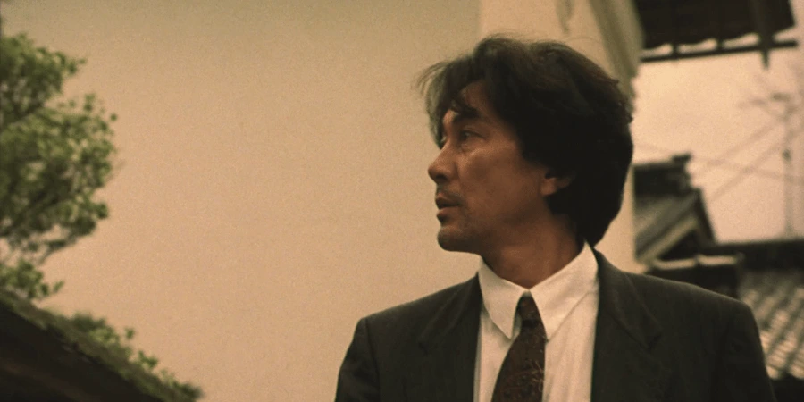 Famous actor, Kōji Yakusho, as a contemporary Salaryman,