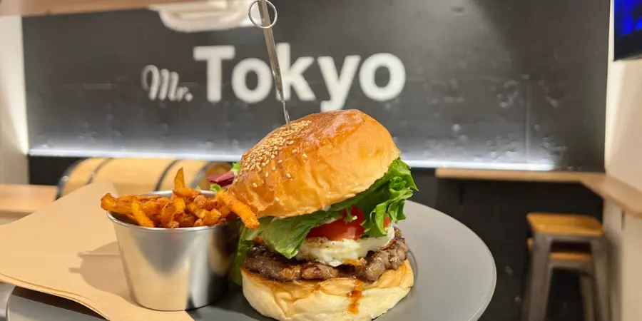 A serving of a burger and fries in the Mr. Tokyo BURGER'S Cafe in Ni-chome