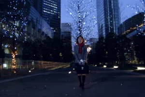 winter city scene in japan during december with illuminated streets festive lights and people enjoying seasonal atmosphere at night.