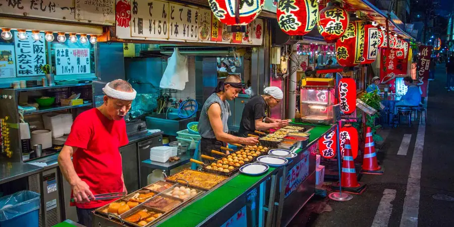 Food stalls in Namba selling local delicacies such as Takoyaki
