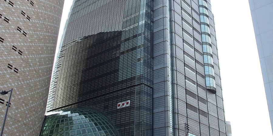 Modern NHK Osaka Broadcasting Center building adjacent to Osaka Museum of History, featuring BK Plaza media exhibits and concert hall, ideal for pre- or post-museum cultural stops.