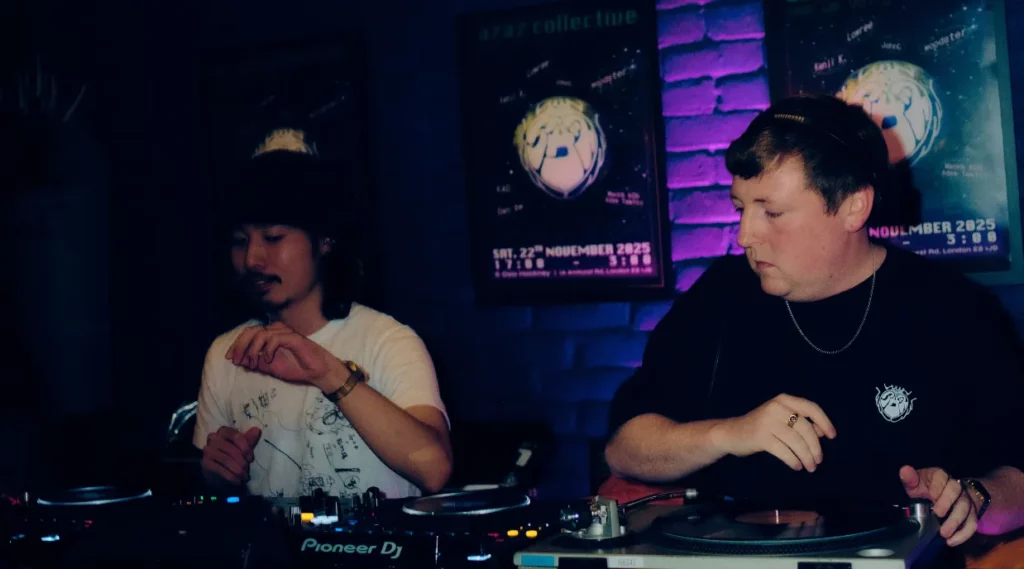 AZAZ Collective DJs playing vinyl at a London music event